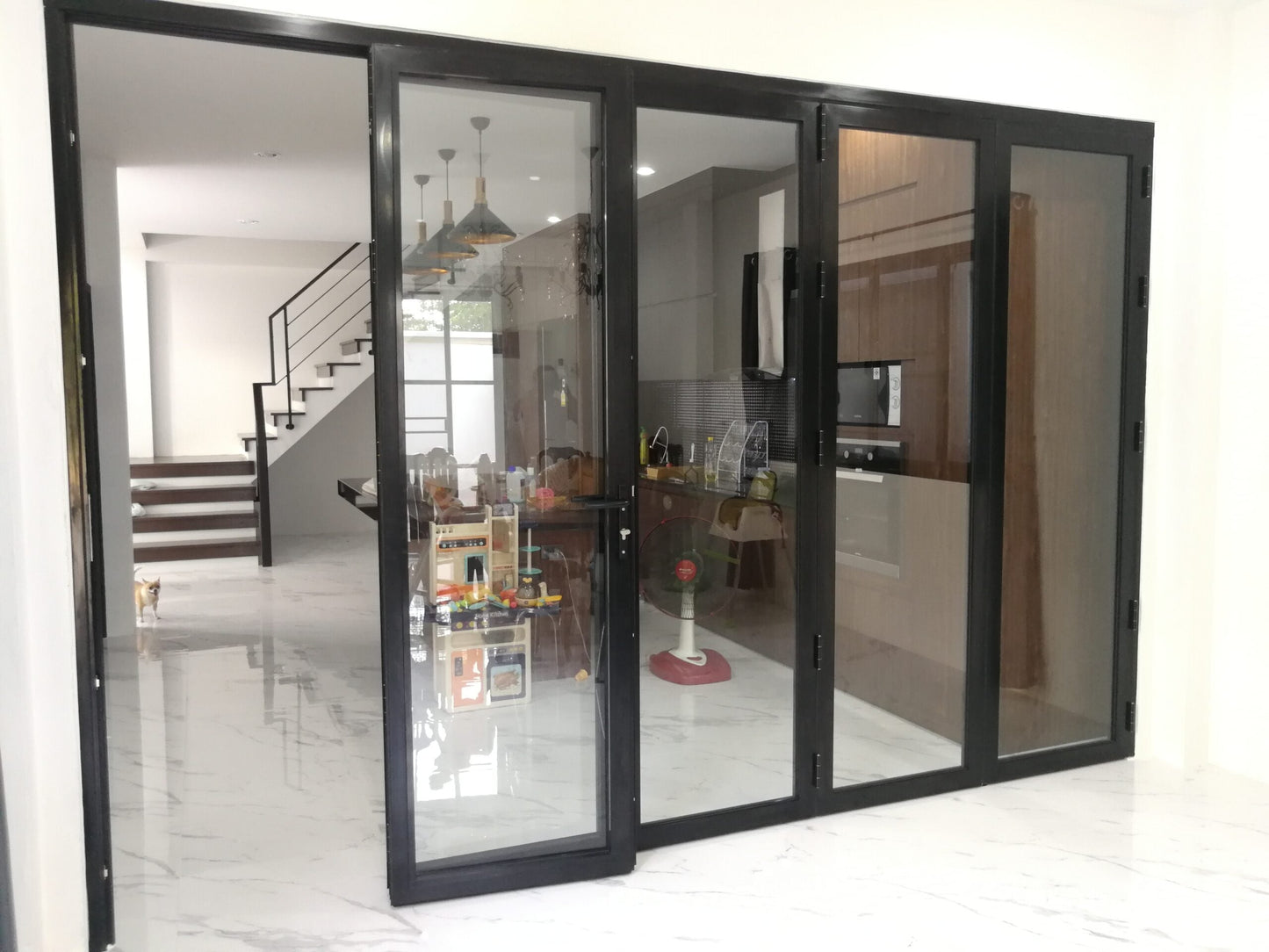 ALUMINUM BIFOLD DOOR 168"WX80"H - OUT SWING FROM EXTERIOR VIEW IMAGE 5
